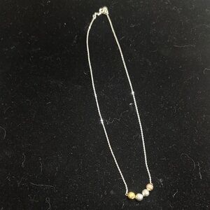 Elegant Silver and Gold Beaded Necklace